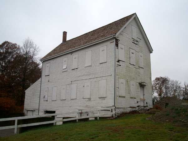 The Print Shop, constructed in about 1890, is the last remaining historic building at Brook Farm. The building is not associated with the Transcendentalist utopian community that briefly flourished on the property in the mid-19th century. It was built by the Lutheran Church, which operated the Martin Luther Orphan’s Home on the property from 1871 to 1944. Photo courtesy Wikipedia. The Print Shop, constructed in about 1890, is the last remaining historic building at Brook Farm. The building is not associated with the Transcendentalist utopian community that briefly flourished on the property in the mid-19th century. It was built by the Lutheran Church, which operated the Martin Luther Orphan’s Home on the property from 1871 to 1944. Photo courtesy Wikipedia.