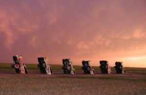 A storm rolls in at Cadillac Ranch near Amarillo, Texas. Photo by Dave Alexander.