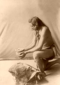 Incense over a medicine bundle, by Edward S. Curtis, 1908