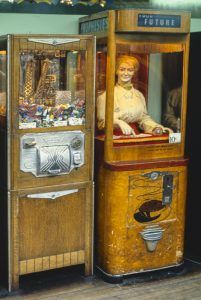 “Morgana,” a seemingly faceless mannequin provided fortunes for a price. However, once the player inserted a dime and typed in a date of birth, Morgana's face suddenly appeared in all of its frightening glory as she spoke and told fortunes. Palace Amusements, Asbury, New Jersey by John Marjolies, 1978.