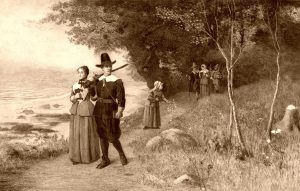 Pilgrims holding bibles