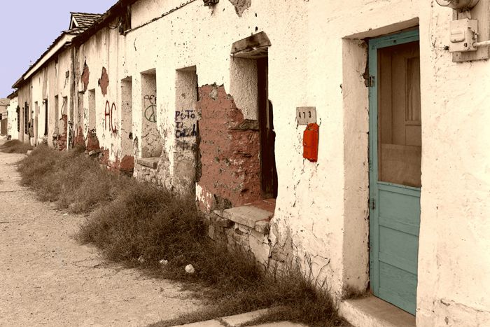 Vintage photo of a building in the Barrio Libre District of Tucson, Arizona. Colorized by Kathy Alexander.